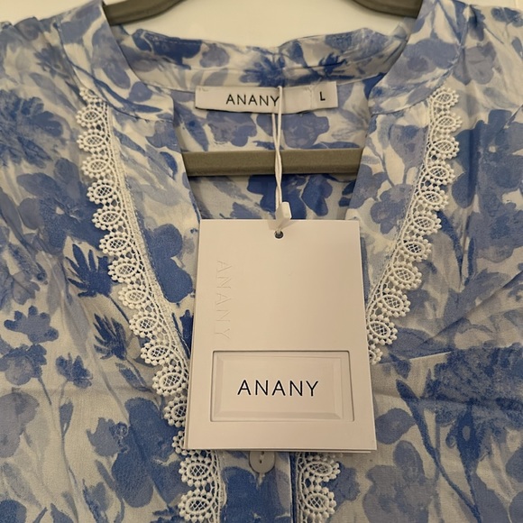 Blue floral dress with ruffle bottom and button down the front detail - Picture 3 of 3